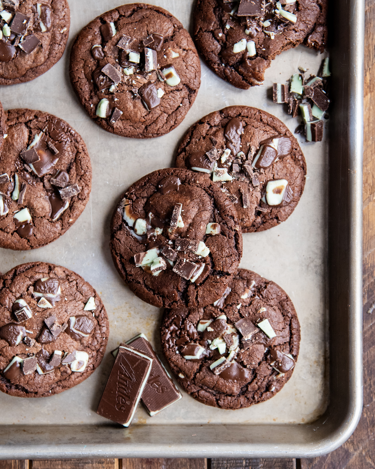 An above view of chocolate mint cookies on a cookie sheet.