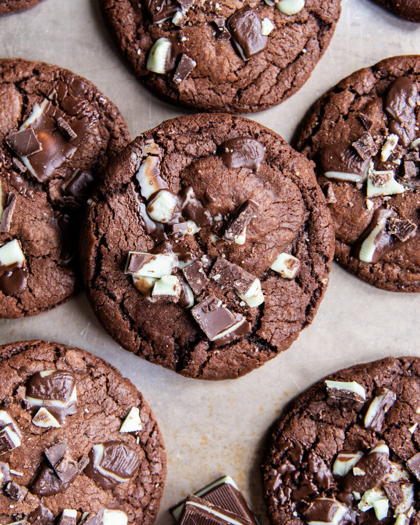 An above view of chocolate mint cookies on a cookie sheet.