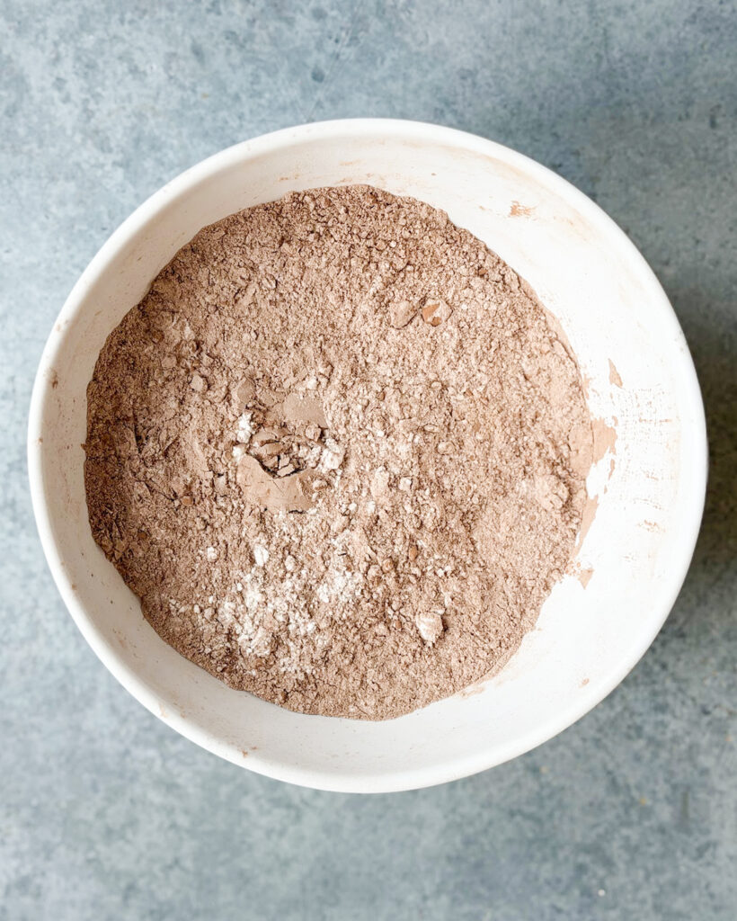 Whisked flour and cocoa powder in a bowl.