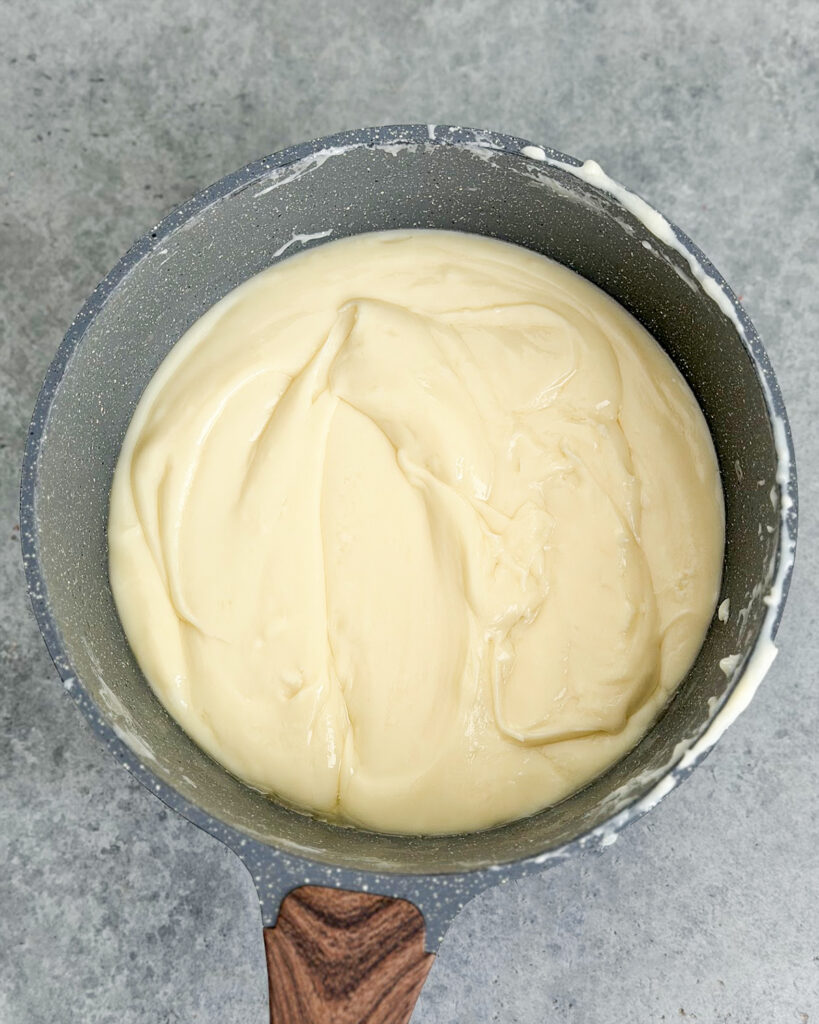 White chocolate fudge in a pot.