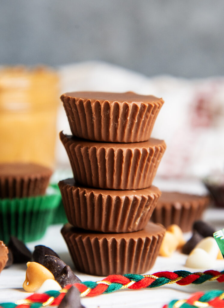 A stack of four chocolate candy cups.