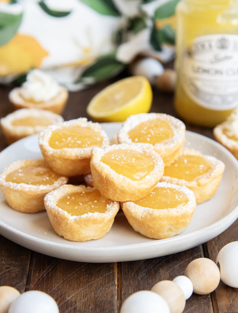 A plate of lemon tassies in a pile.