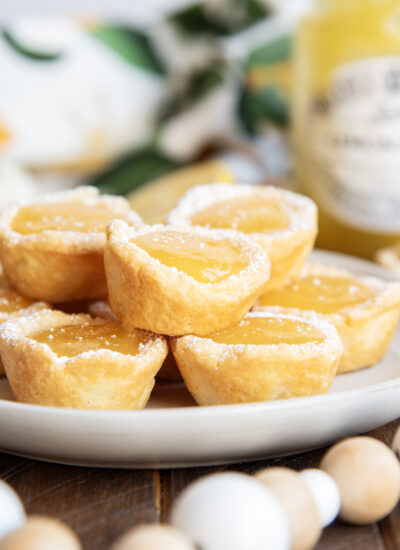 A plate of lemon tassies in a pile.