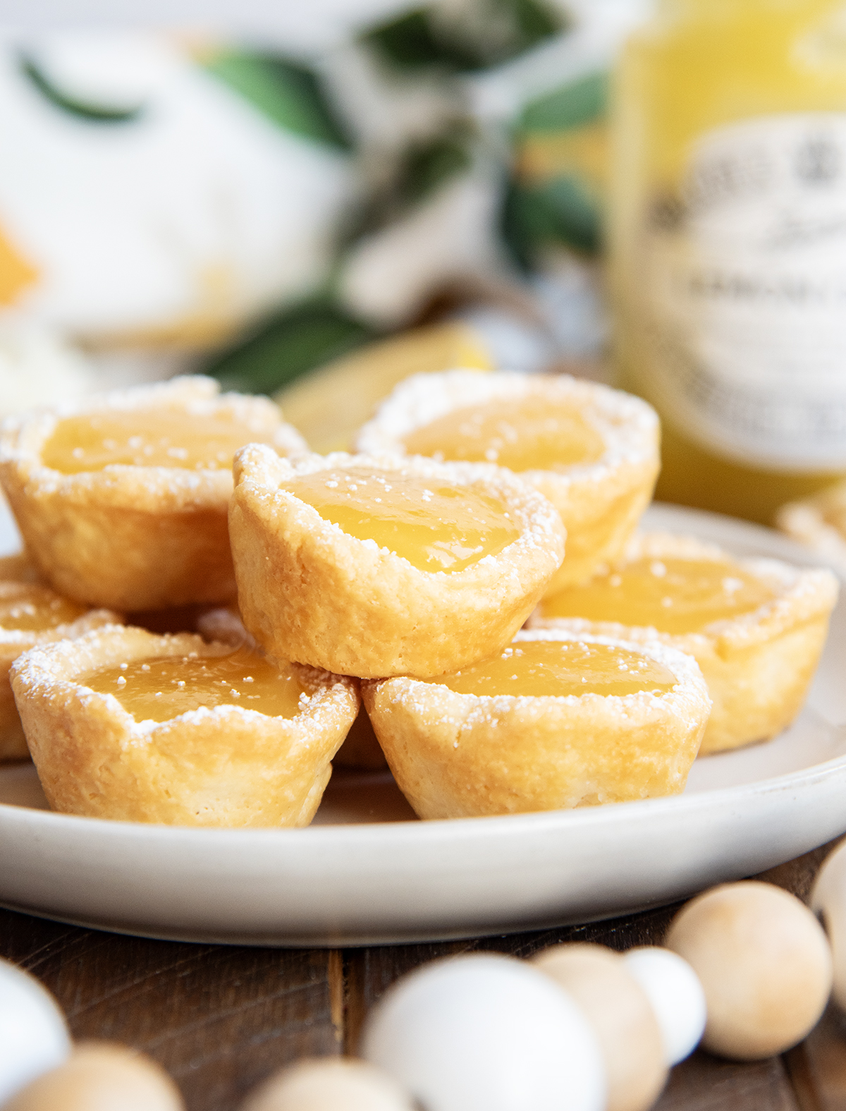A plate of lemon tassies in a pile.