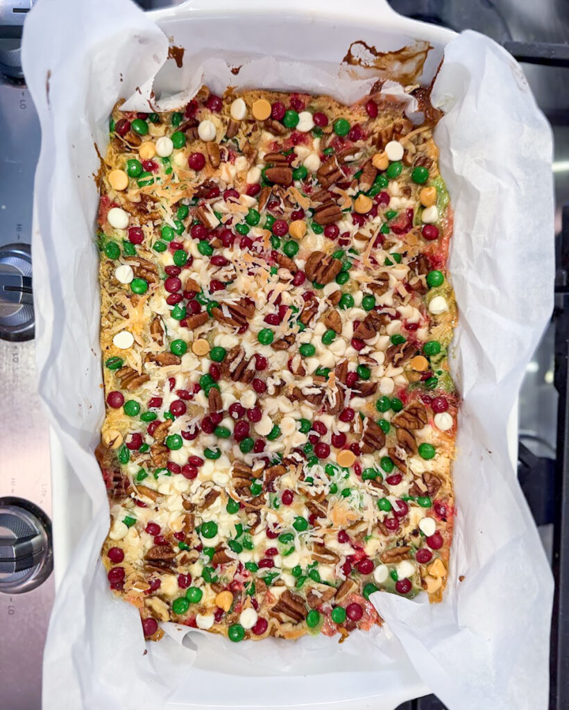 An above view of baked Christmas seven layer bars.
