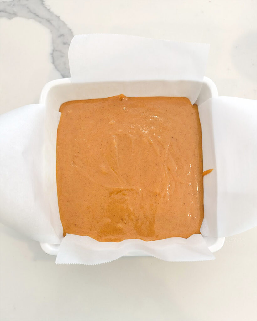 Caramels in a white square dish.